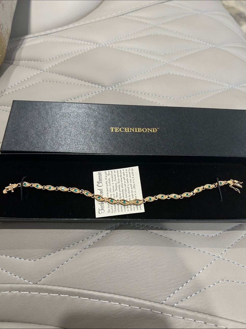 Technibond Gold-Tone Bracelet with Emerald-Green Accents. Size 8